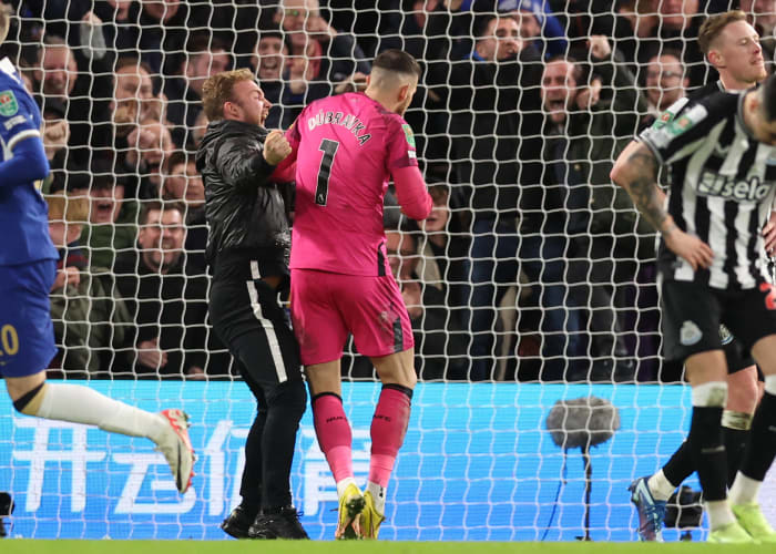 A Chelsea fan pictured barging into Newcastle United goalkeeper Martin Dubravka moments after Mykhailo Mudryk had scored a late equalizer in an EFL Cup quarter-final at Stamford Bridge in December 2023